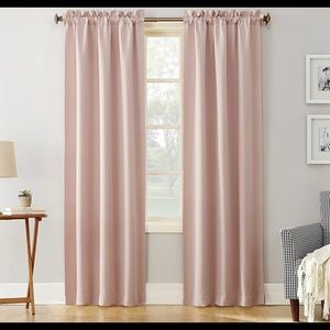 SUN ZERO WINDOW PANEL SET OF TWO PANELS EACH 40 IN X 95 IN  THE COLOR IS  BLUSH